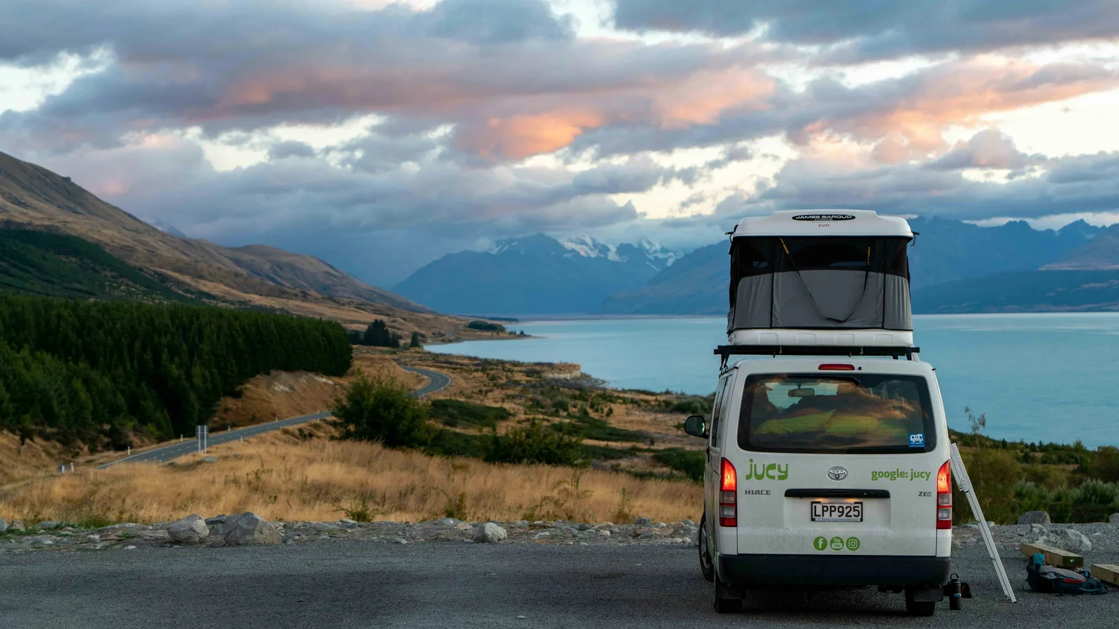 Authorised freedom camping sign beside a campervan