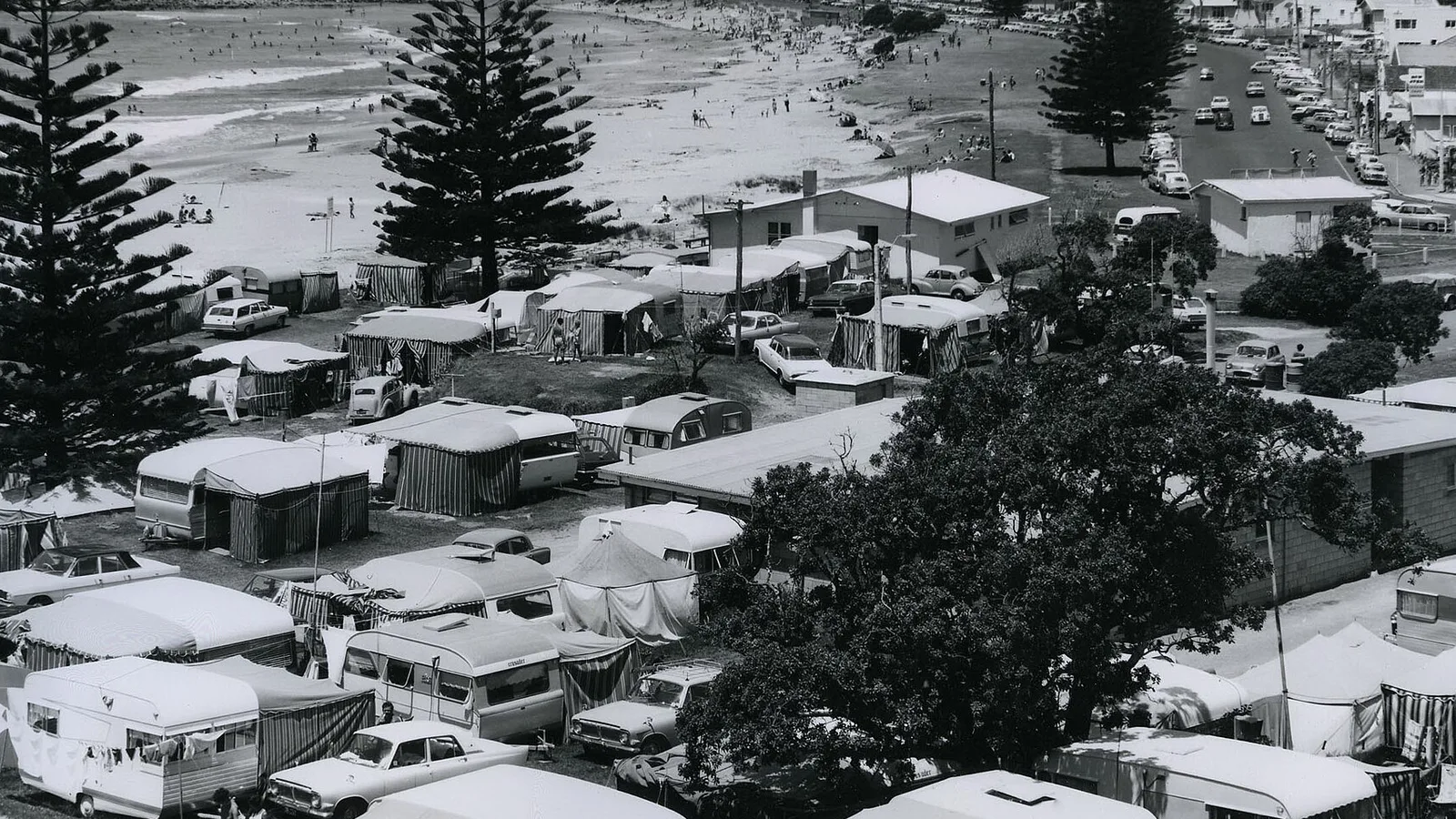 Camping equipment packed beside a New Zealand campervan