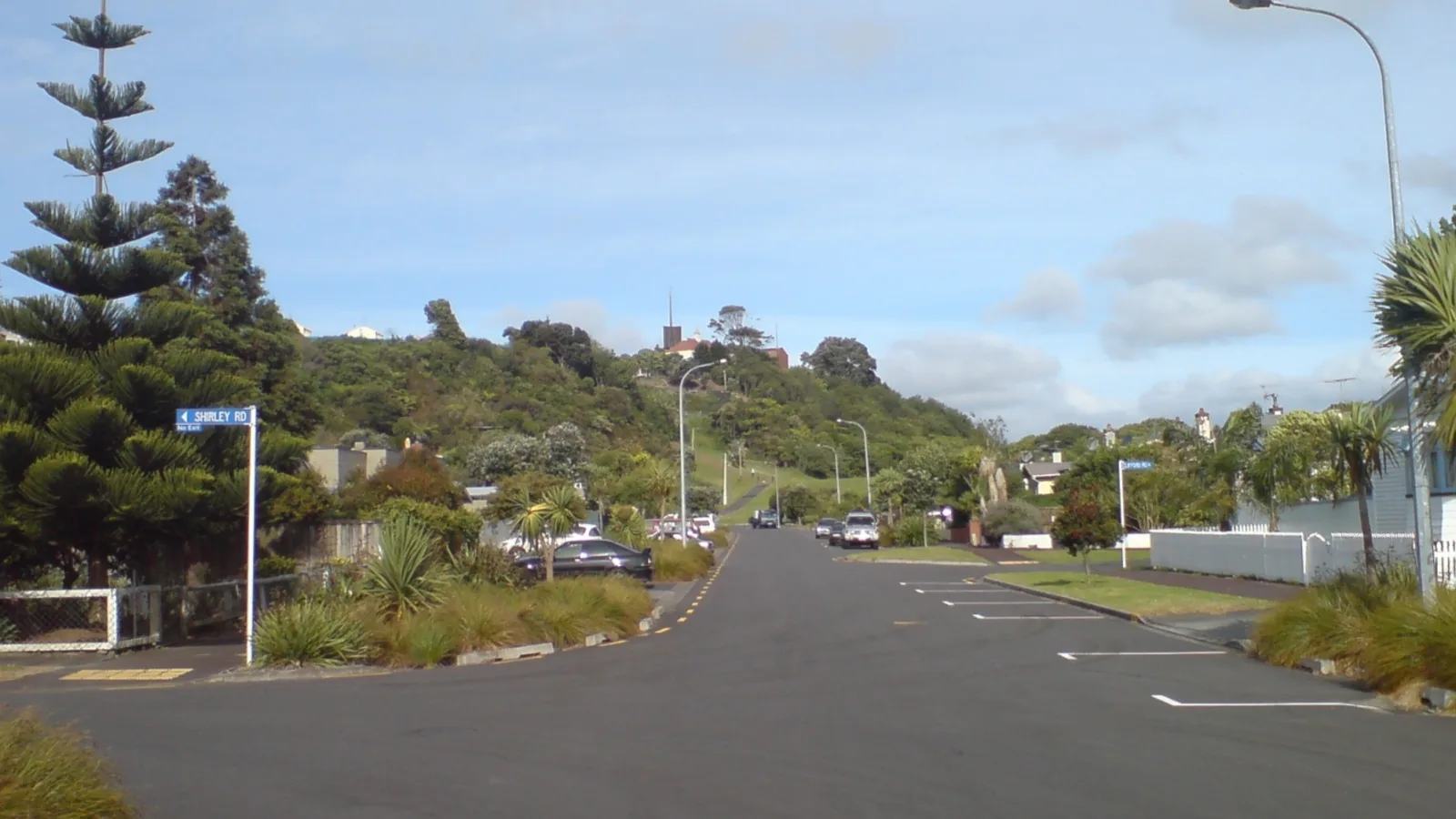Winding New Zealand road through hills
