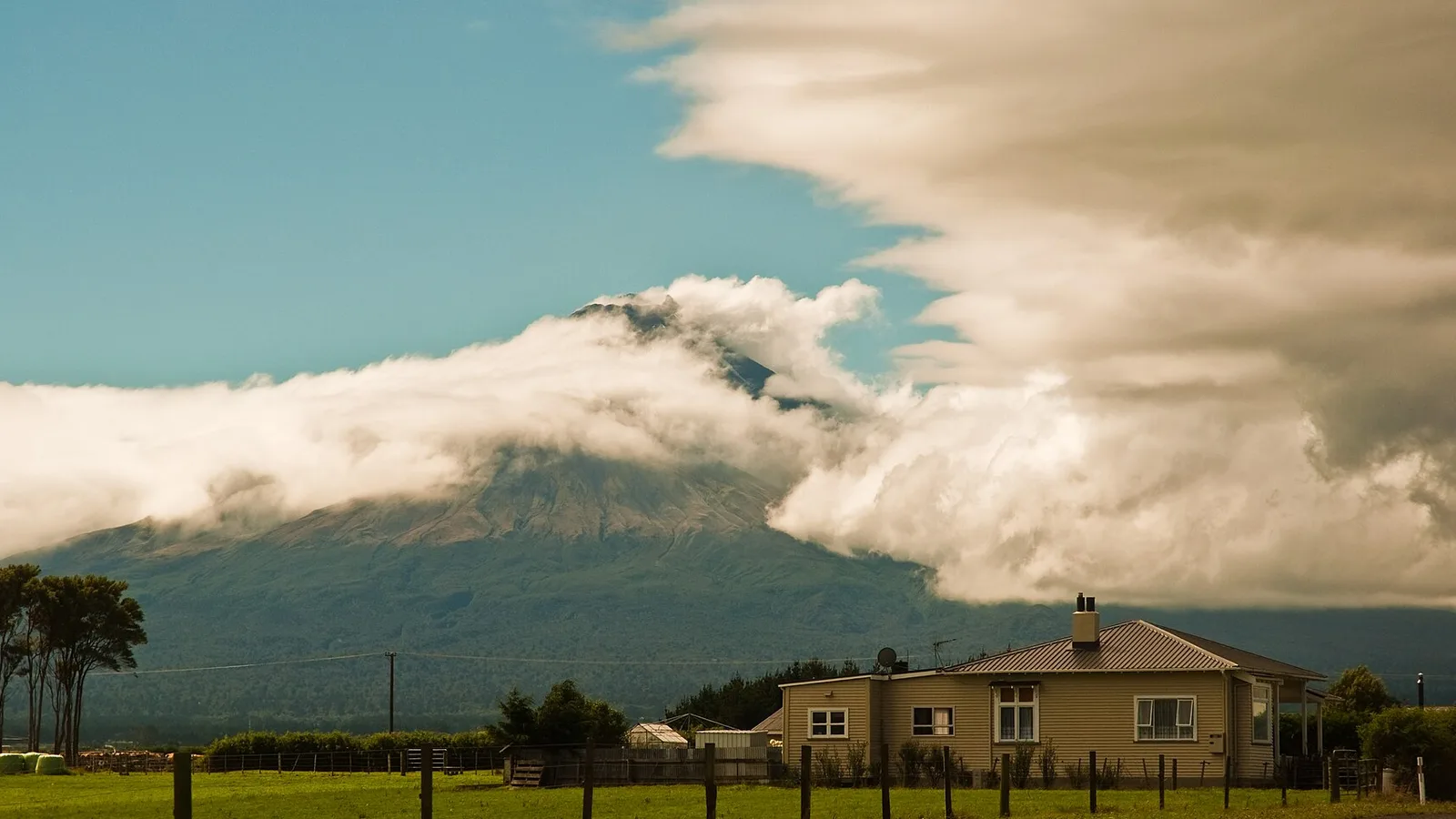 Mount Taranaki above a rural highway